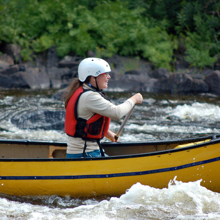 Madawaska Canoeing (Black Feather)